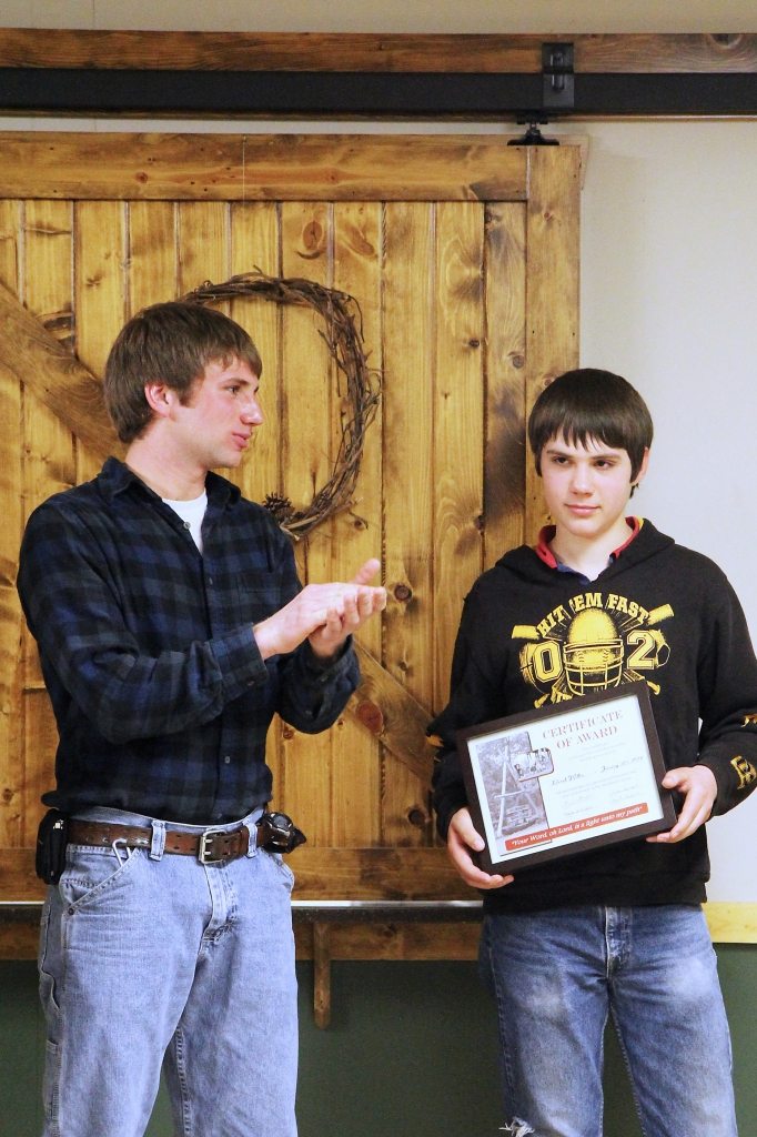 graduating from program for troubled youth